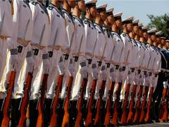 World View: China Defends Military Spending as Promoting Global Peace
